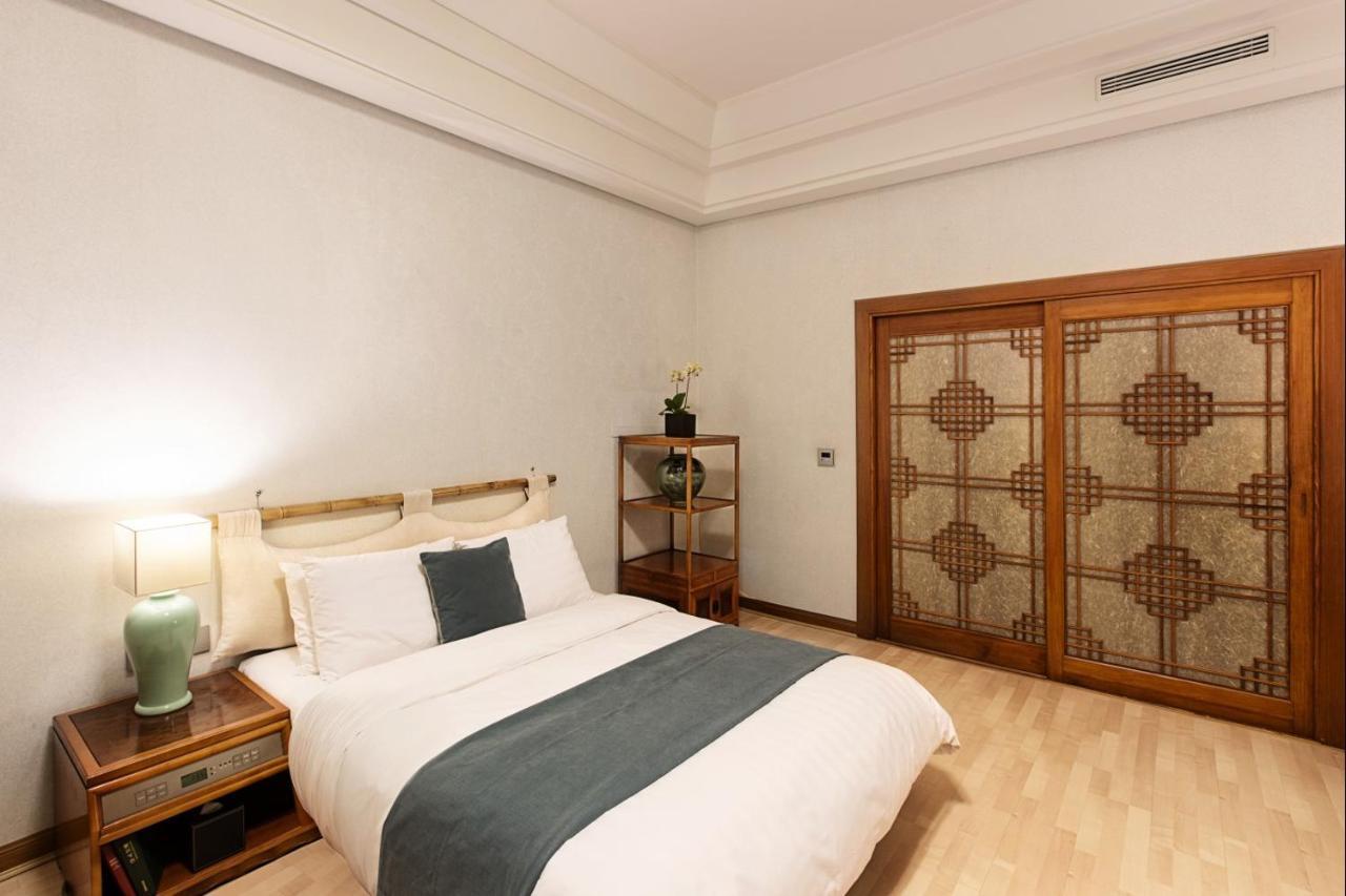 Haeundae Grand Hotel Busan Extérieur photo A bedroom at the hotel