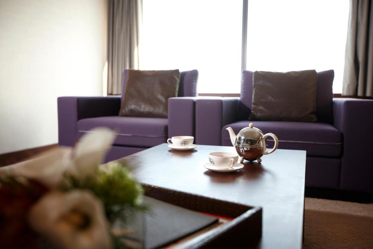Haeundae Grand Hotel Busan Extérieur photo A living room at the hotel