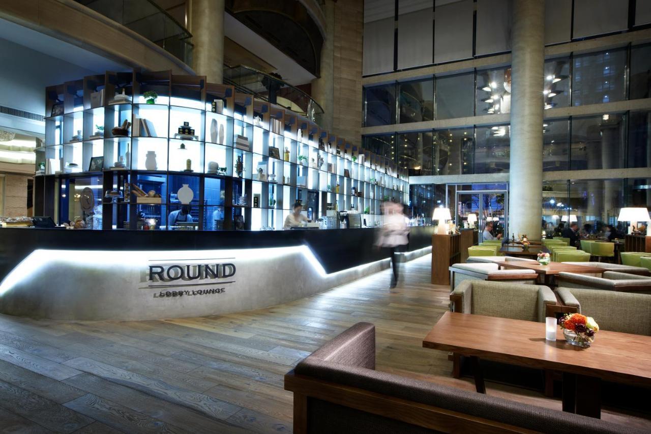 Haeundae Grand Hotel Busan Extérieur photo The Round Lounge at London Heathrow Airport